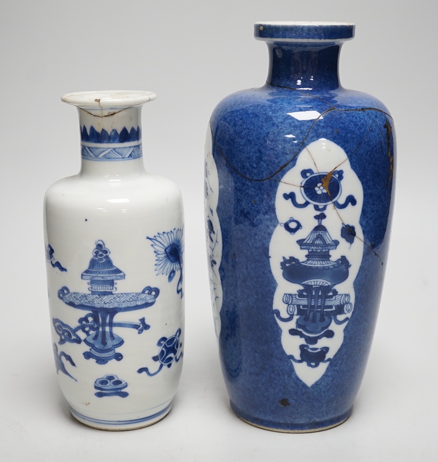 A Chinese blue and white ‘precious objects’ export vase, together with a Chinese powder blue export vase, open vignettes (a.f.) tallest 24.5cms